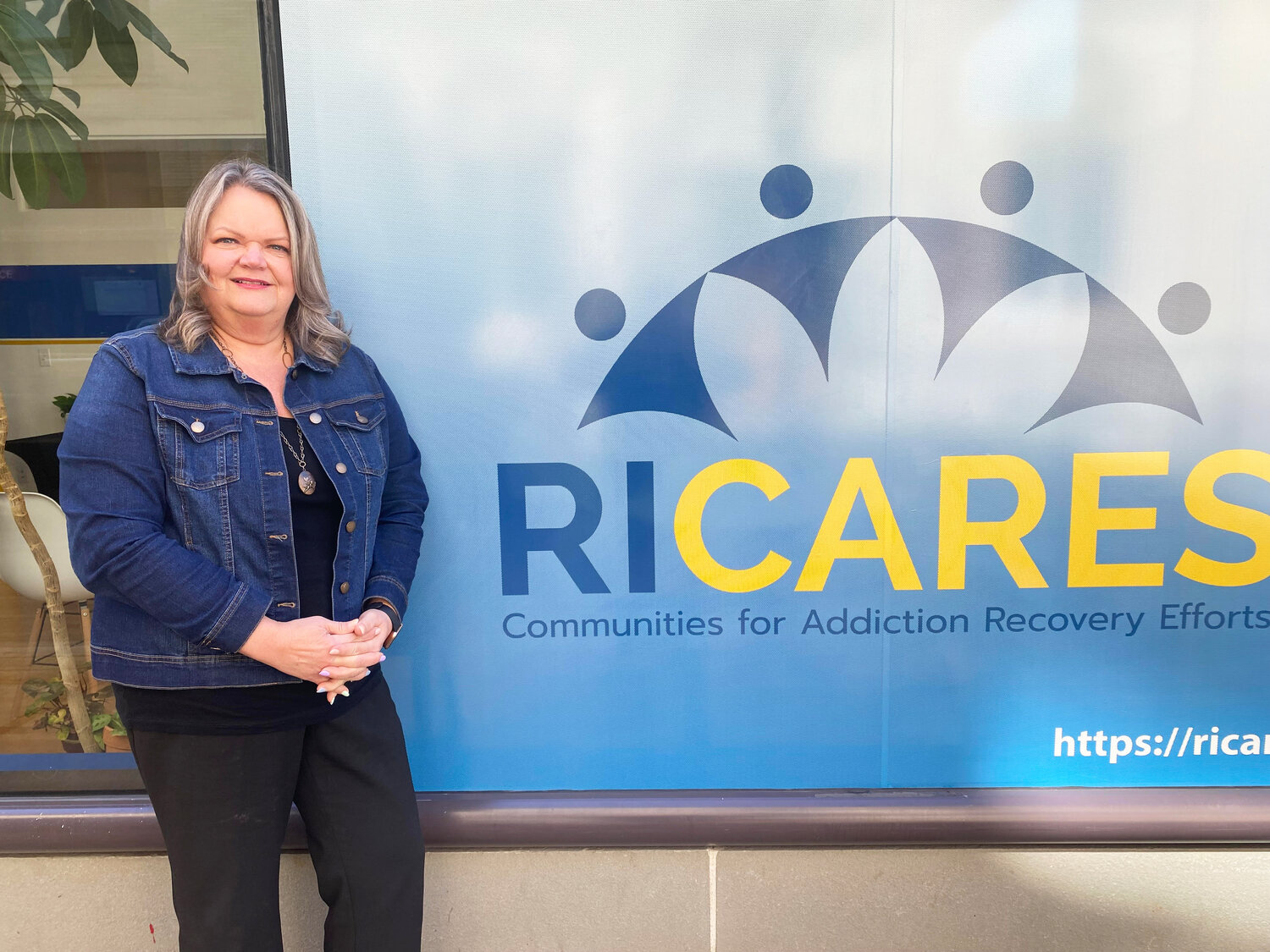 Sandy Valentine, executive director of RICARES, outside her office in downtown Providence.